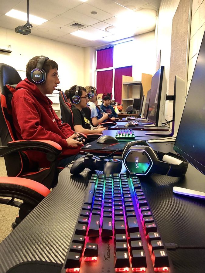 Prospective Esports members practice during open gym.